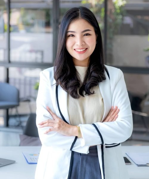 business-woman-joyful-smiling-bookkeeper-s-standing-in-the-working-office.jpg
